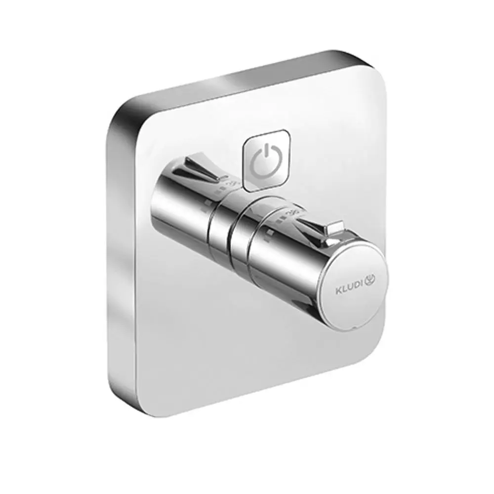Wandmontierter Thermostat von Kludi mit Drucktaste und einem Auslass. Ausführung in Chrom mit abgerundeten Kanten.